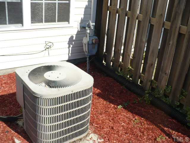3406 Sosa Road Raleigh, NC 27610 - Photo 15 of 16 a bathroom with a sink and a mirror