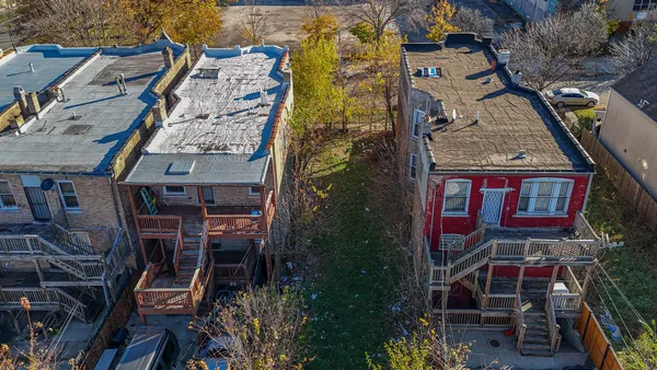 an aerial view of a highlighted house