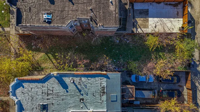 a view of a backyard of the house