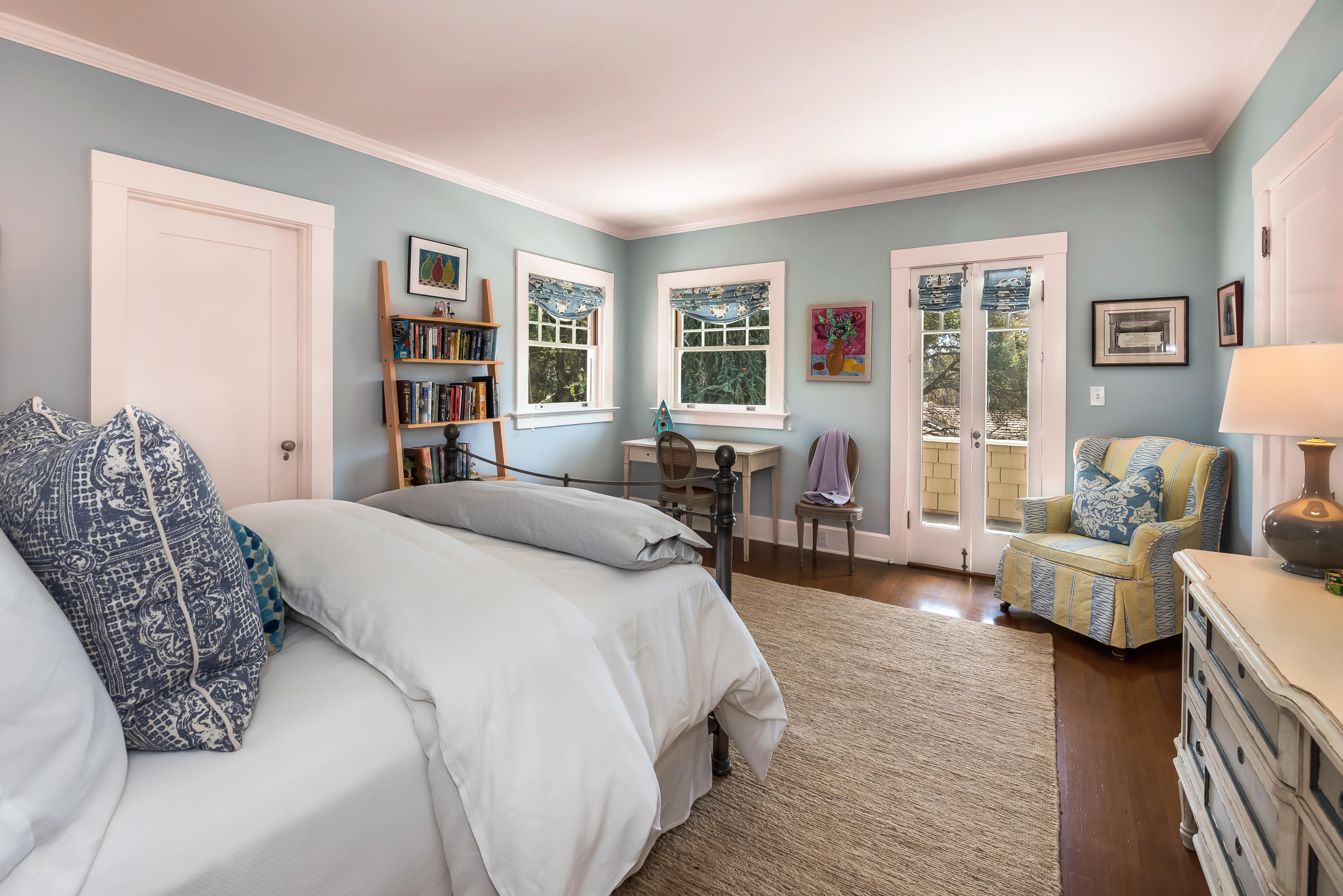 287 Middle Montecito Ca Montecito, CA 93108 - Photo 15 of 25 a spacious bedroom with a bed a couch and a bookshelf