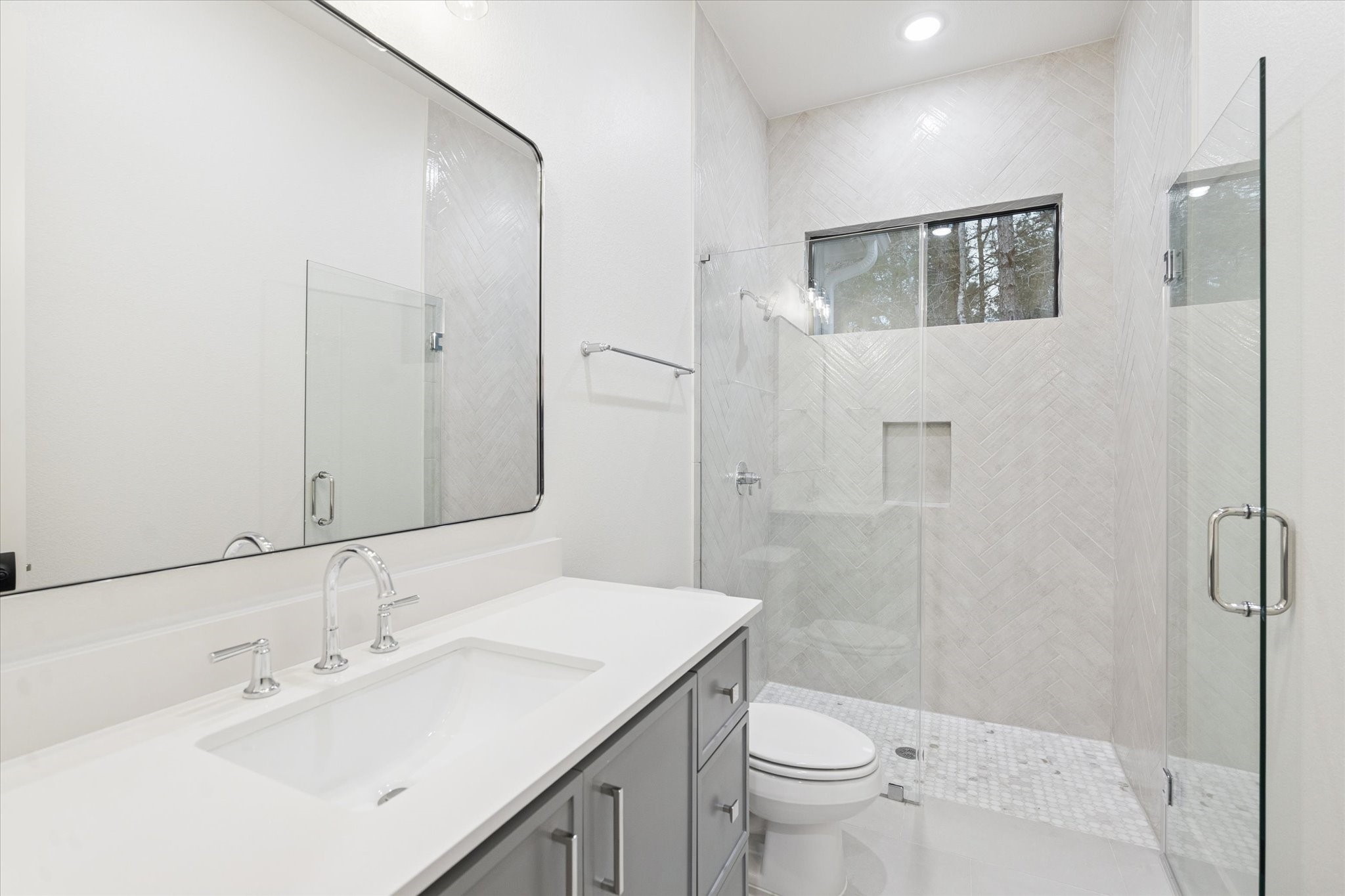 25179 Balmorhea Way Montgomery, TX 77316 - Photo 28 of 40 a bathroom with a sink toilet and shower