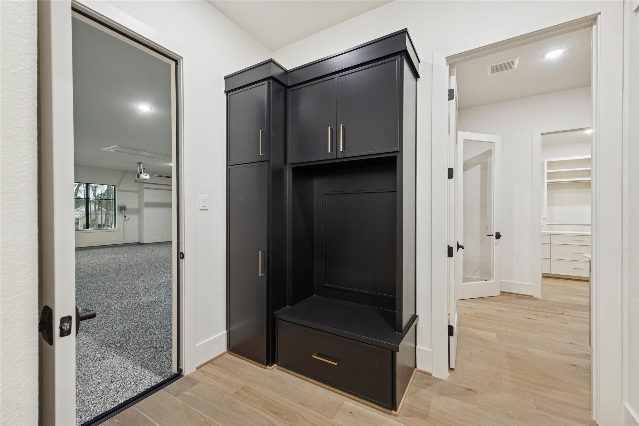 25179 Balmorhea Way Montgomery, TX 77316 - Photo 32 of 40 a bathroom with a glass shower door and a sink