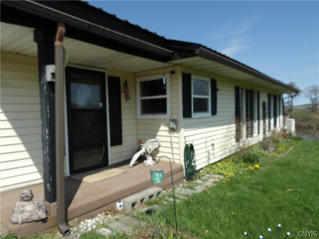 421 Cortland Road Dryden, NY 13068 - Photo 5 of 50 Covered front porch/trex decking