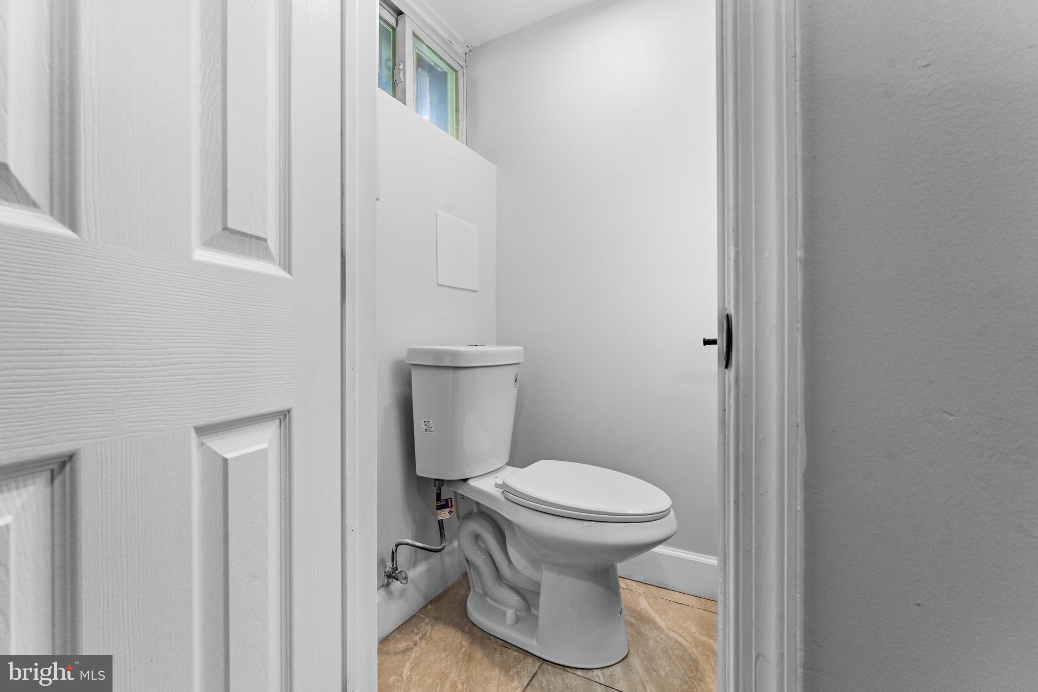 1632 Lochwood Road Baltimore, MD 21218 - Photo 29 of 46 Lower Level Powder Room
