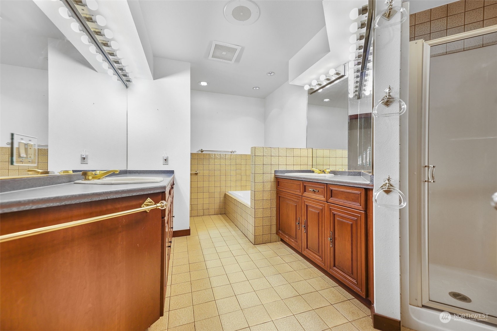 33600 132nd Street Southeast Sultan, WA 98294 - Photo 29 of 40 a large bathroom with a sink a vanity and a large mirror