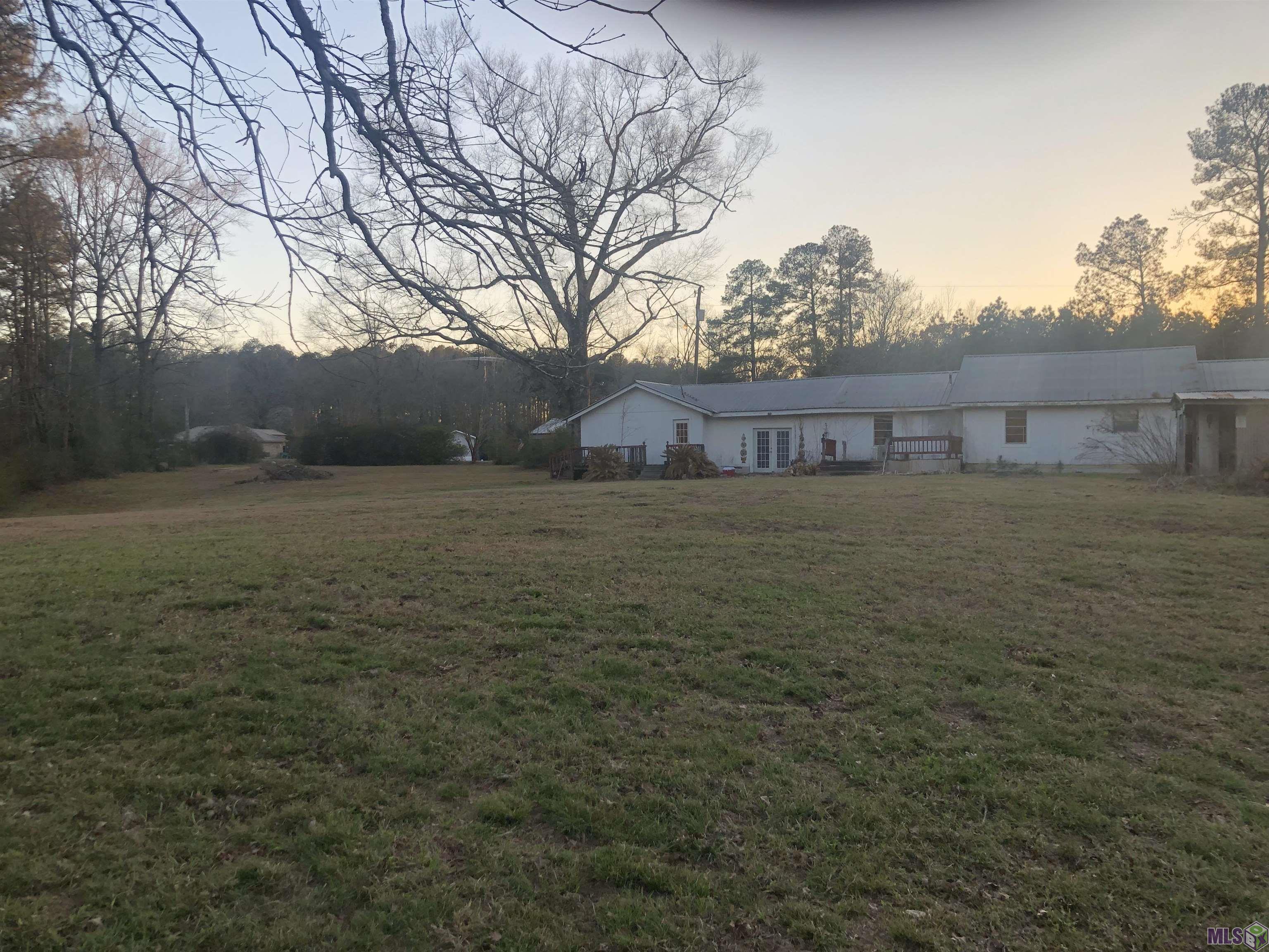 2713 La Highway Clinton, LA 70722 - Photo 8 of 16 Back Yard in Evening