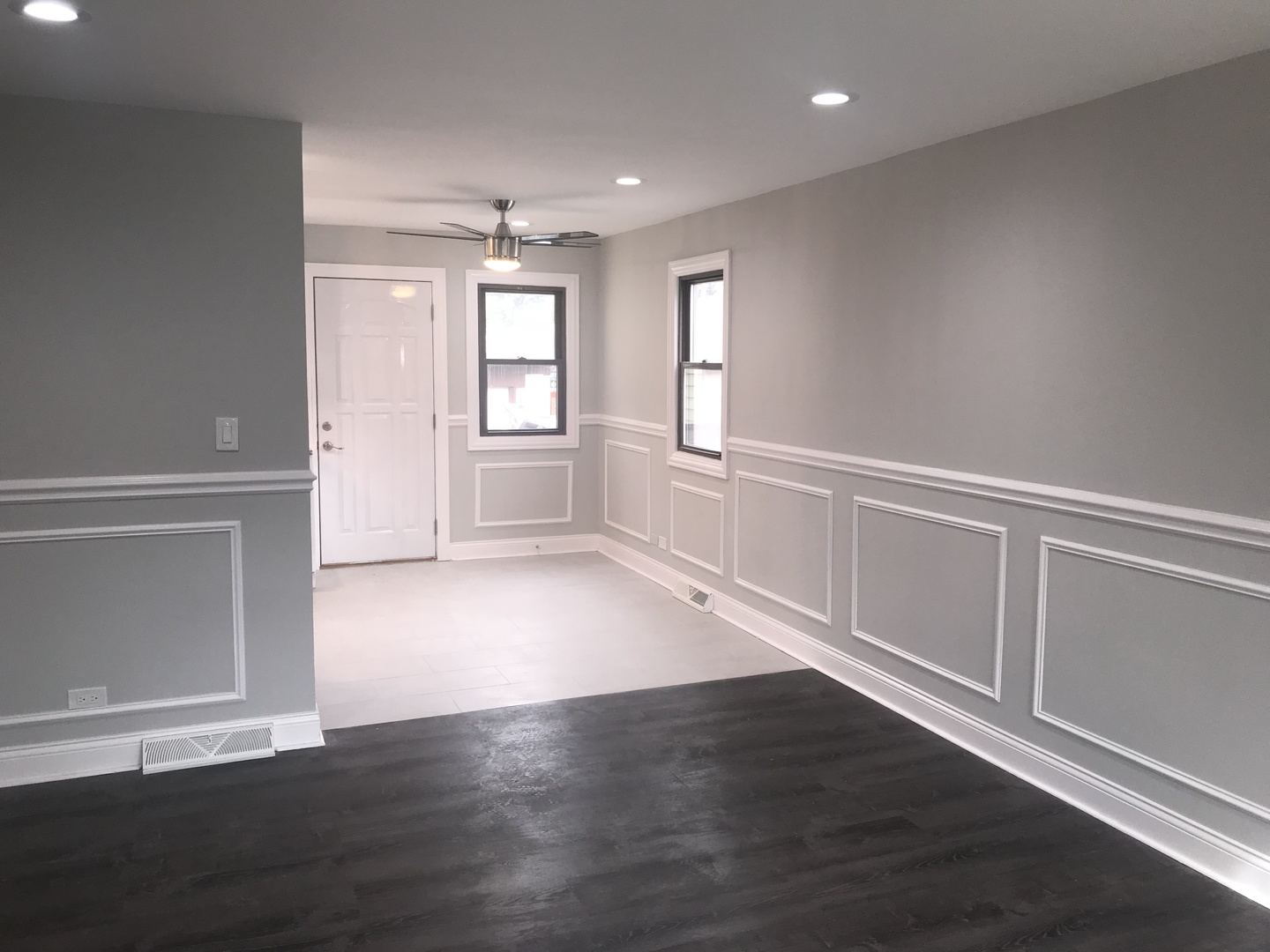 3710 147th Place Midlothian, IL 60445 - Photo 2 of 13 an empty room with wooden floor and windows