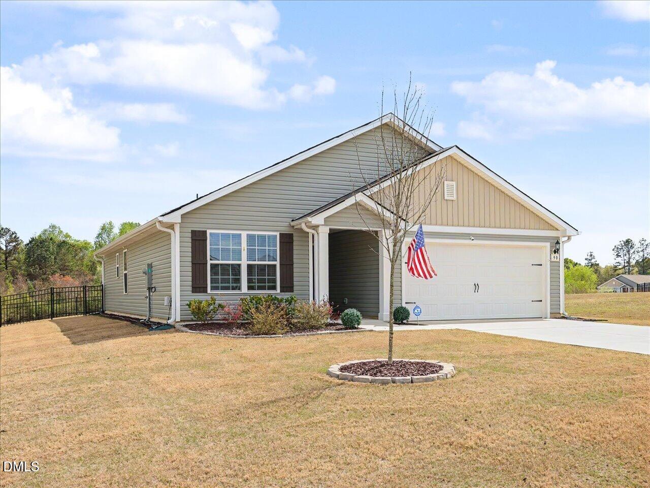 90 Barnsley Road Angier, NC 27501 - Photo 4 of 40 a front view of a house with garden