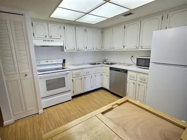 a view of a livingroom with furniture and window