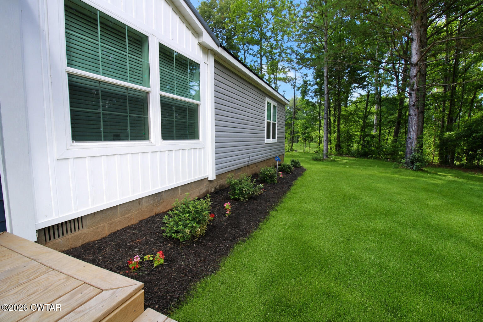 398 Pope Road Lexington, TN 38351 - Photo 14 of 21 a house view with a garden space