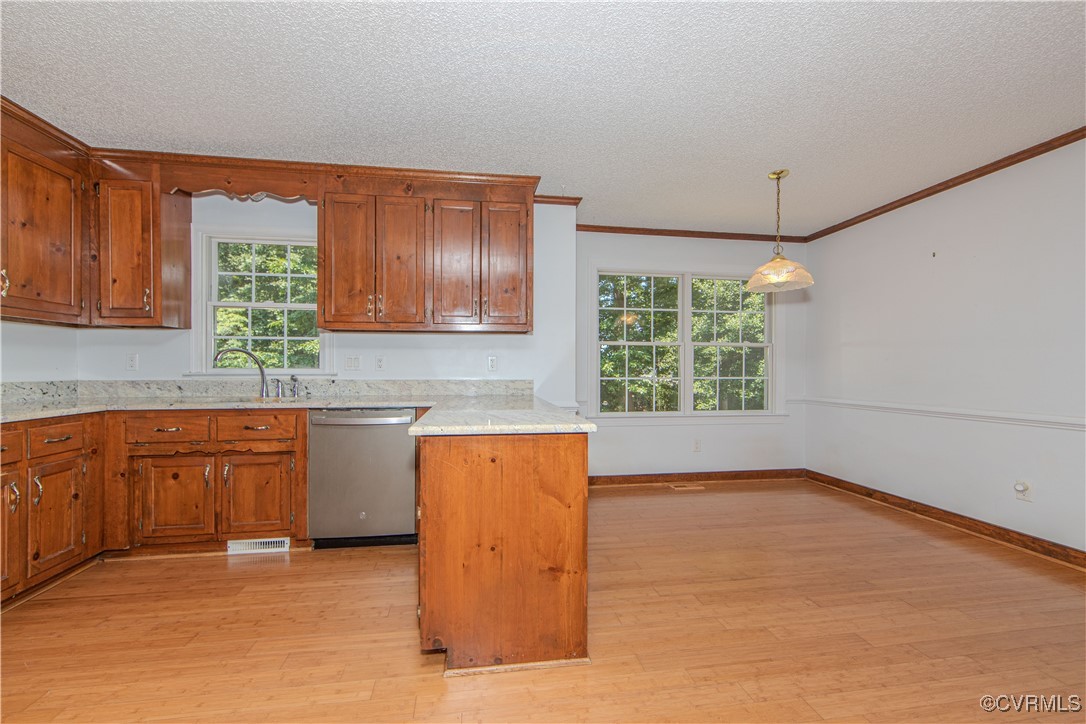 4728 Treely Road Chester, VA 23831 - Photo 16 of 38 a kitchen with stainless steel appliances granite countertop a sink cabinets and a window