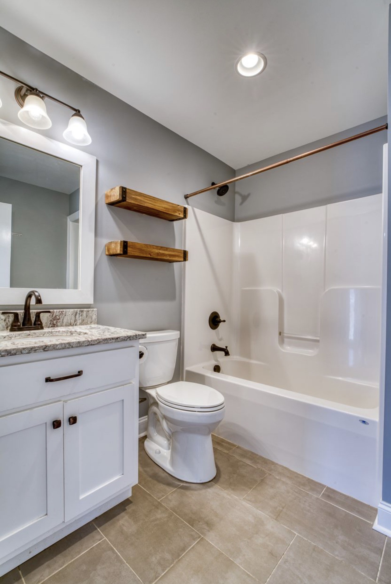 807 Clear Creek Road Pulaski, TN 38478 - Photo 5 of 17 a bathroom with a sink toilet and shower