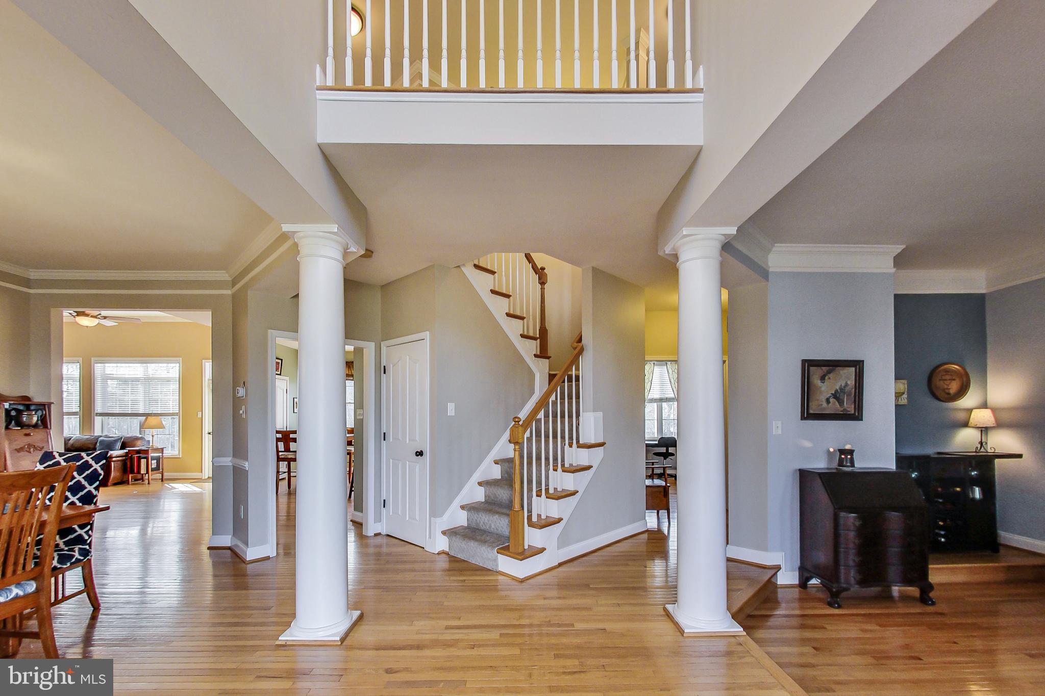 Enter into the open two-story foyer