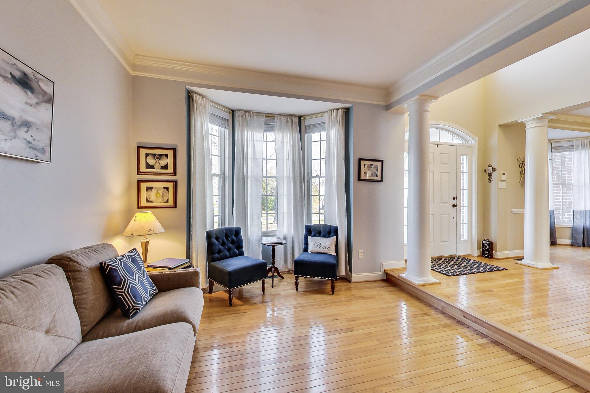 Sunken Living Room with hardwood floor