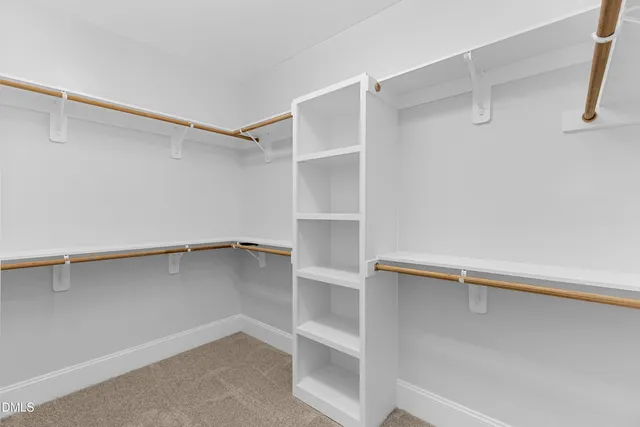 a view of an empty walk in closet