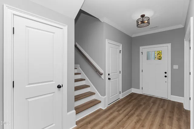 a view of entryway with wooden floor