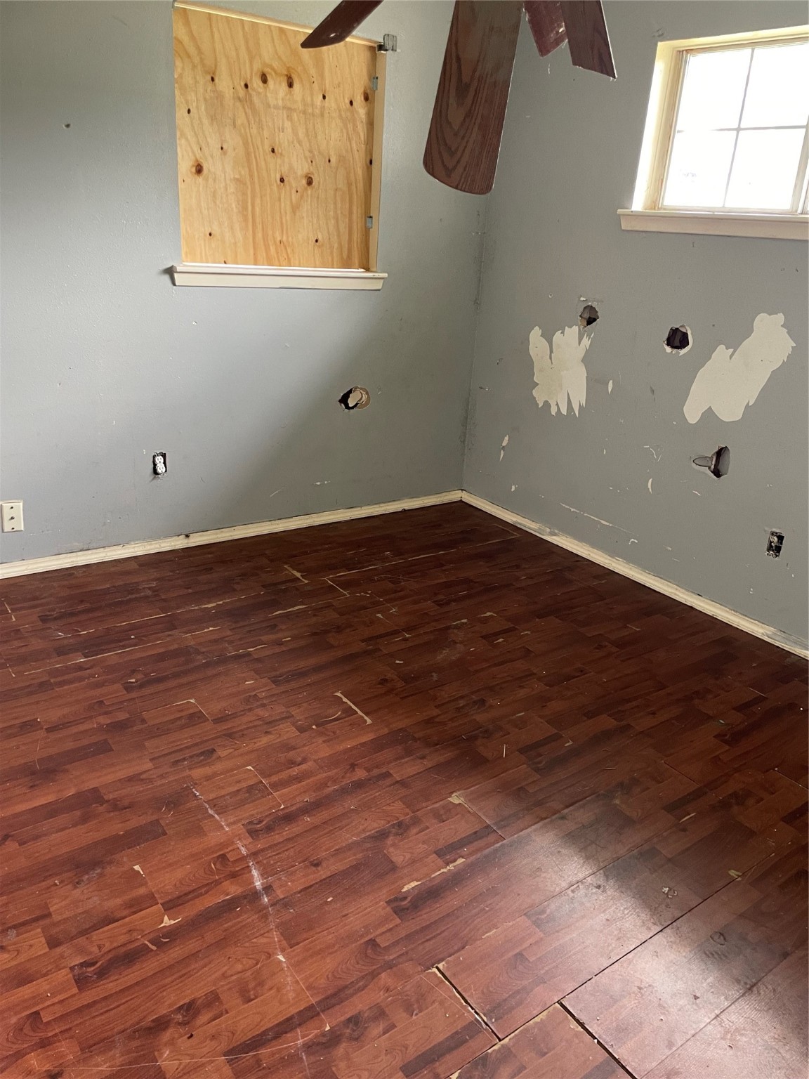 814 Deercrest Street Channelview, TX 77530 - Photo 7 of 14 a view of a room with wooden floor and white walls