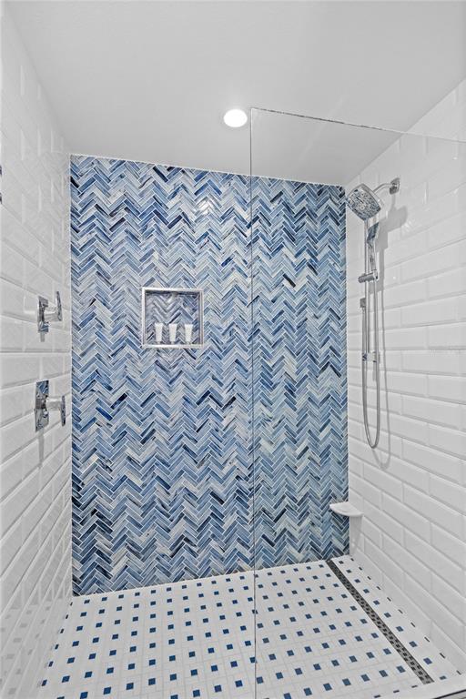 230 Sands Point Road, Unit 3205 Longboat Key, FL 34228 - Photo 20 of 38 a bathroom with a shower