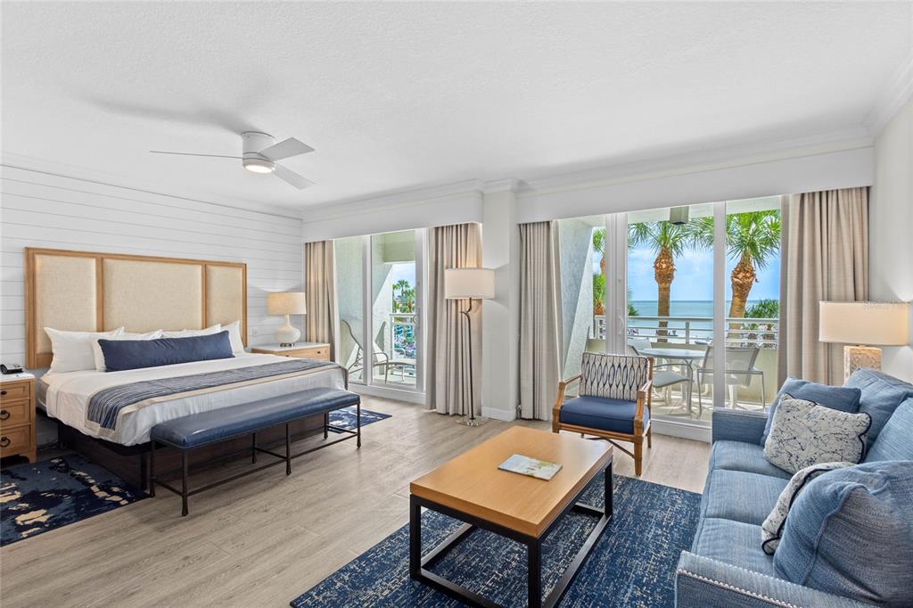 230 Sands Point Road, Unit 3205 Longboat Key, FL 34228 - Photo 5 of 38 a living room with furniture and a window