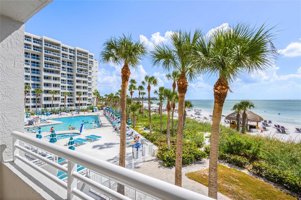 230 Sands Point Road, Unit 3205 Longboat Key, FL 34228 - Photo 9 of 38 a view of balcony with palm trees