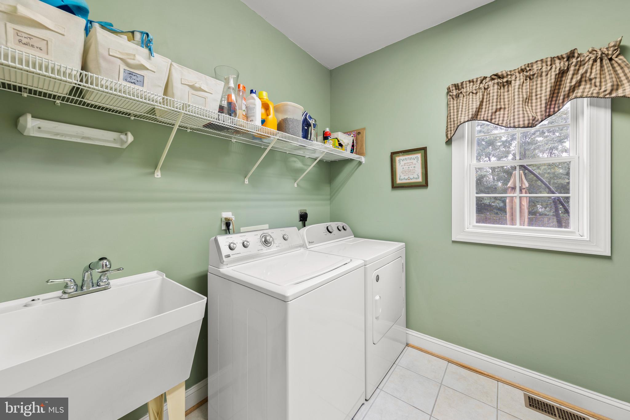 117 Cool Spring Drive Stephens City, VA 22655 - Photo 26 of 60 Main level laundry with wash tub & shelving