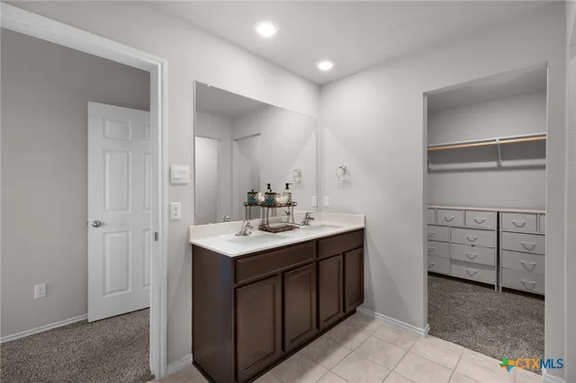 a bathroom with a toilet and a sink