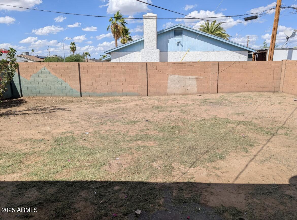 3302 East Thunderbird Road Phoenix, AZ 85032 - Photo 9 of 10 a view of a backyard of the house