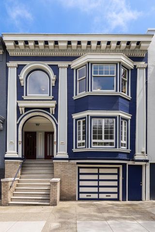 an aerial view of a house with a garden
