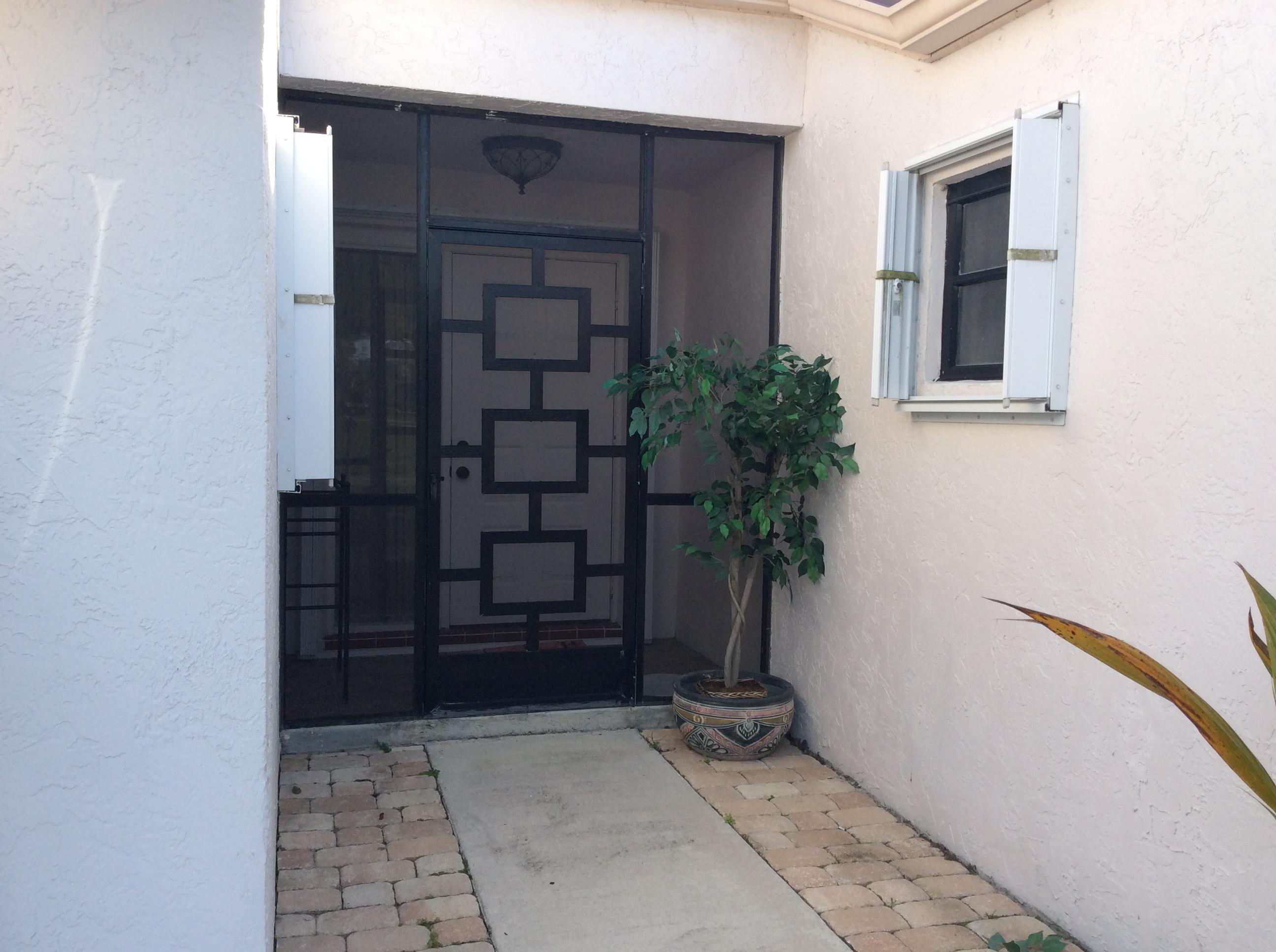 11584 Quiet Waters Lane Boca Raton, FL 33428 - Photo 6 of 31 Front entrance
