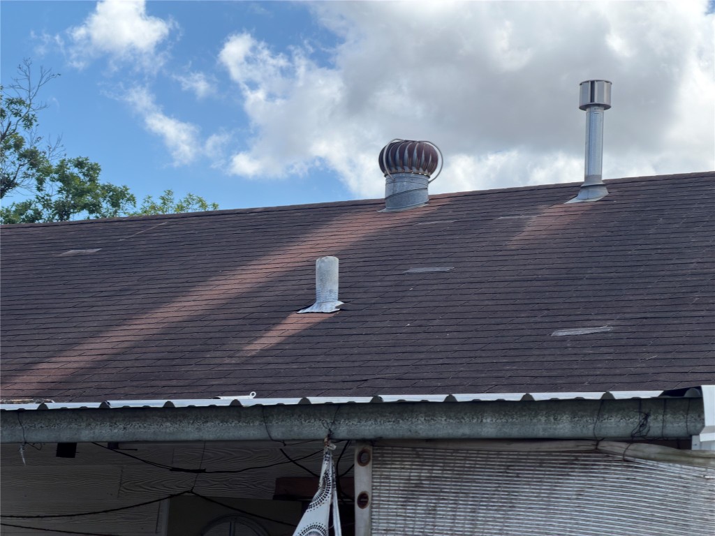 619 Burke Road Pasadena, TX 77506 - Photo 17 of 23 ROOF OF MAIN HOUSE