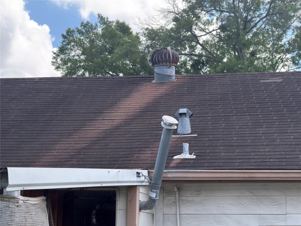 619 Burke Road Pasadena, TX 77506 - Photo 18 of 23 ROOF OF MAIN HOUSE