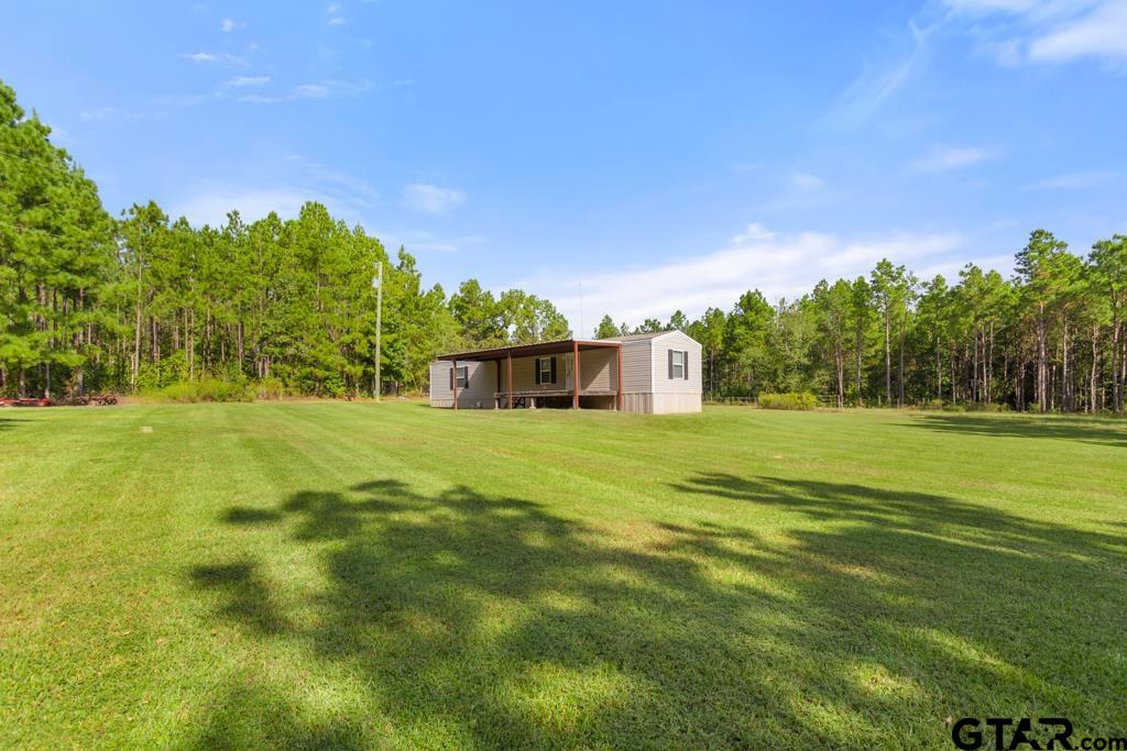 5379 County Road 385 Tyler, TX 75708 - Photo 38 of 44 a view of a house with a big yard