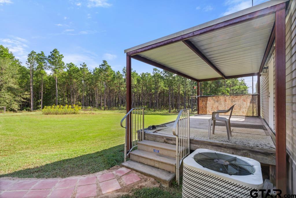 5379 County Road 385 Tyler, TX 75708 - Photo 39 of 44 a view of swimming pool with a patio