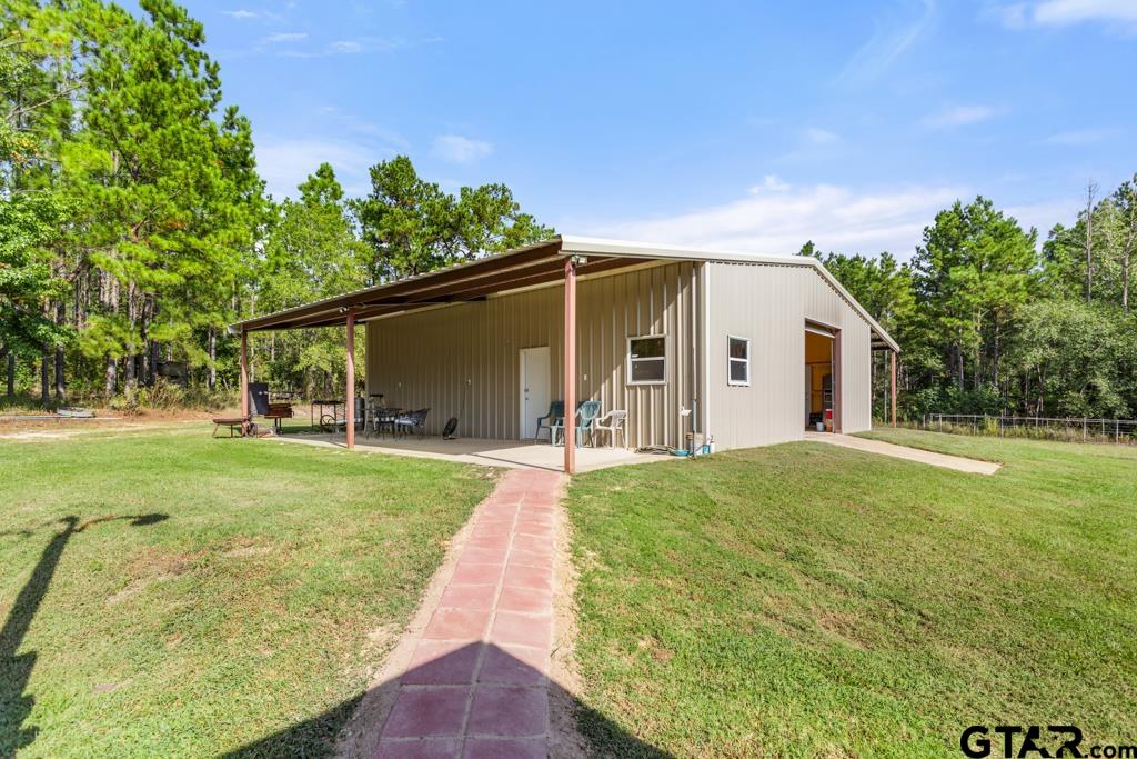 5379 County Road 385 Tyler, TX 75708 - Photo 8 of 44 a front view of house with yard