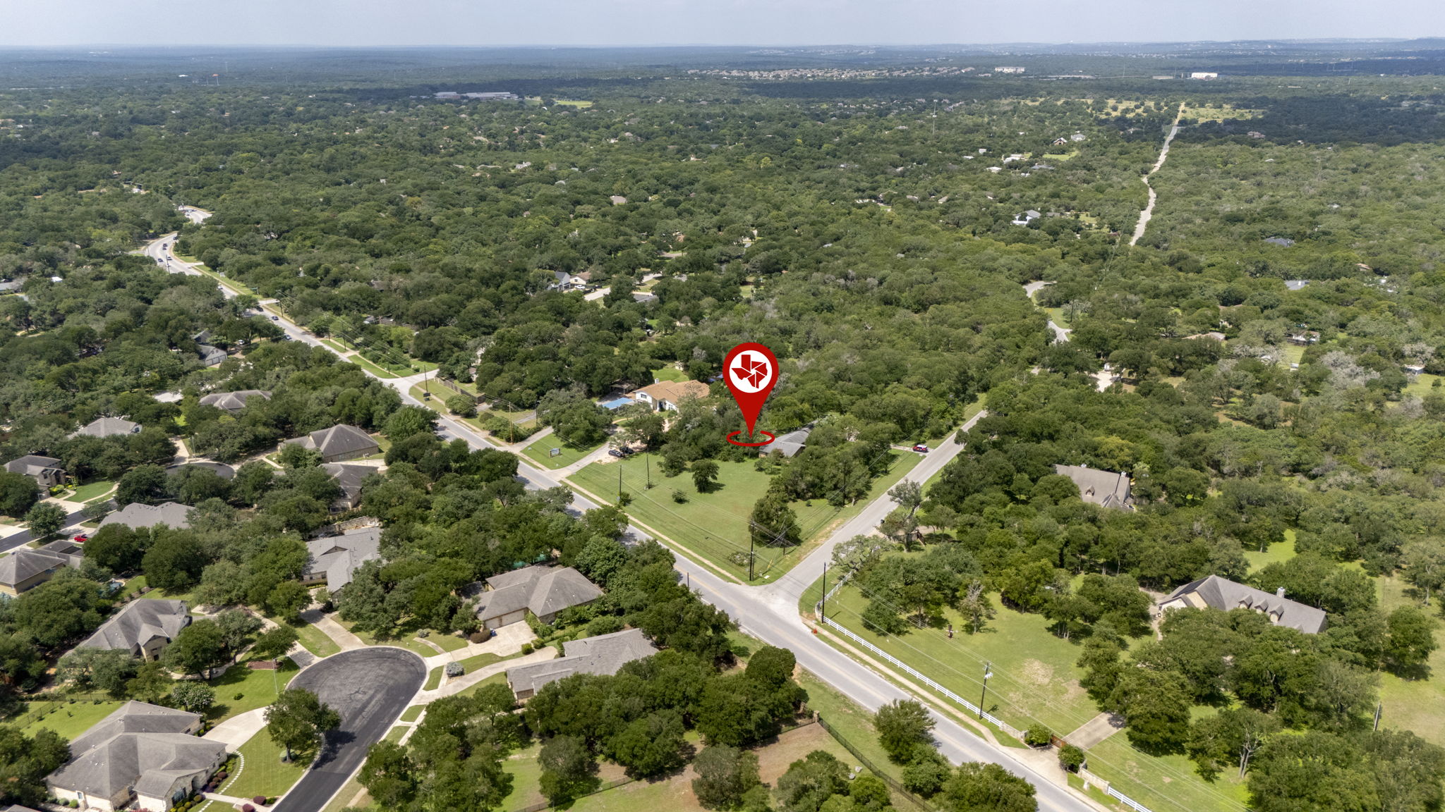 3511 Wyldwood Road Austin, TX 78739 - Photo 3 of 40 Drone / aerial view of a heavily wooded area