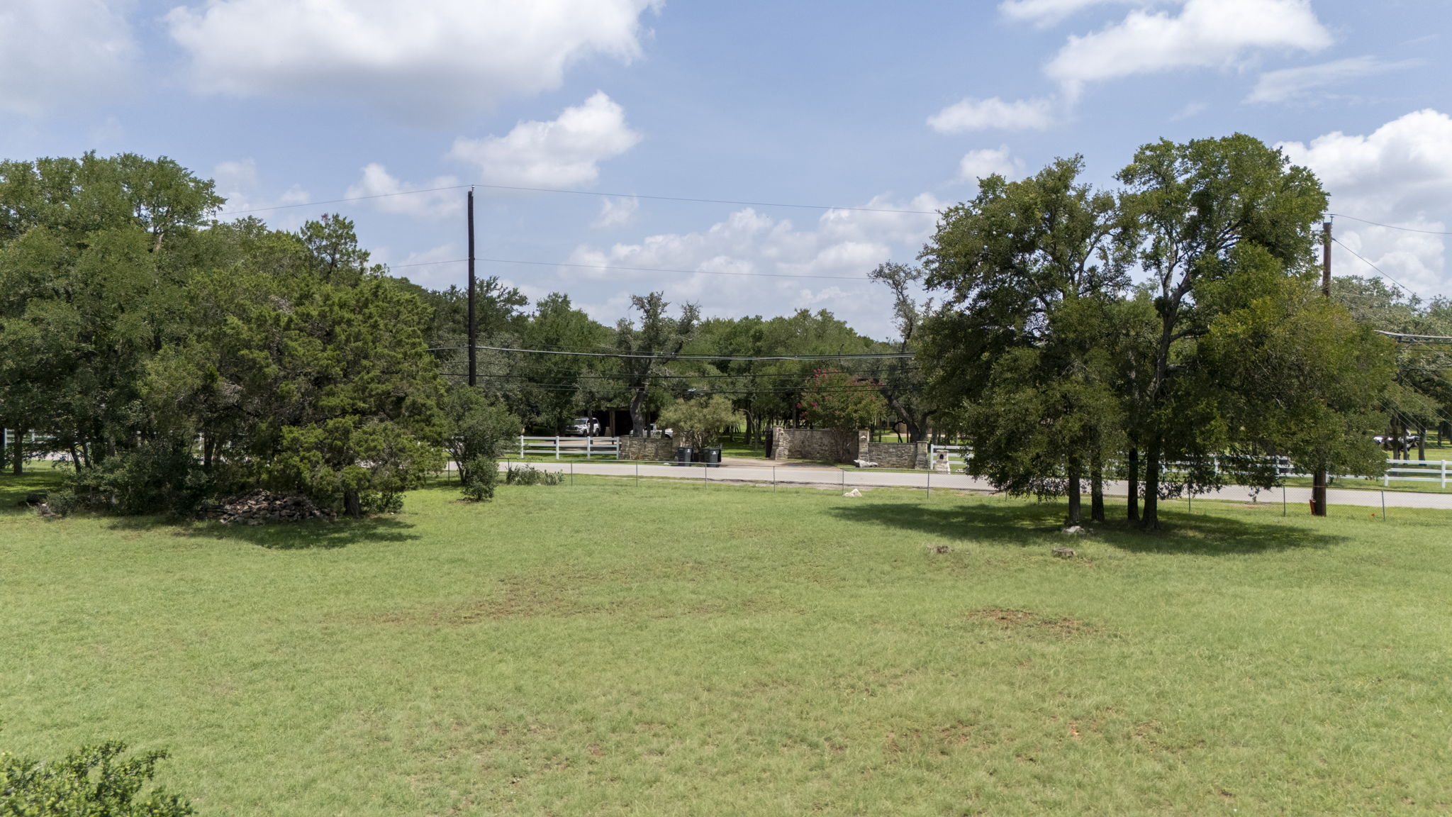 3511 Wyldwood Road Austin, TX 78739 - Photo 40 of 40 View of home's community featuring a lawn