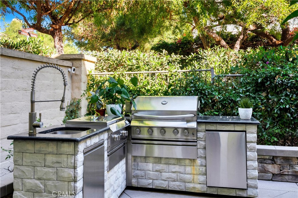 1 Via Santander San Clemente, CA 92673 - Photo 28 of 48 a stove top oven sitting inside of a kitchen