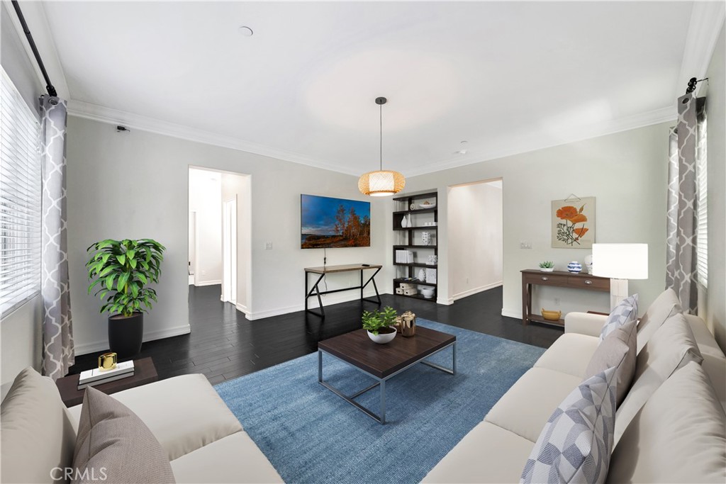 1 Via Santander San Clemente, CA 92673 - Photo 31 of 48 a living room with furniture a chandelier and a rug