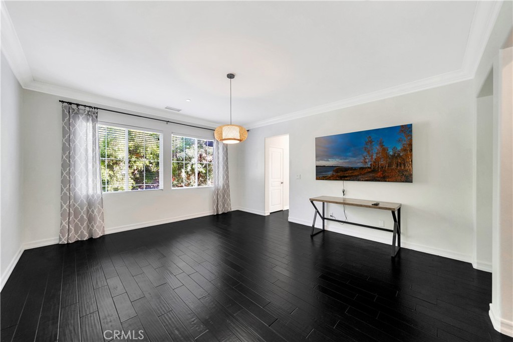 1 Via Santander San Clemente, CA 92673 - Photo 33 of 48 a view of an empty room with wooden floor and a window