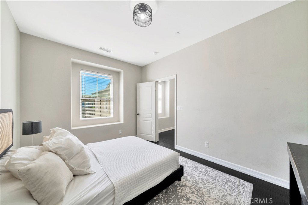 1 Via Santander San Clemente, CA 92673 - Photo 38 of 48 a bedroom with a bed and a window