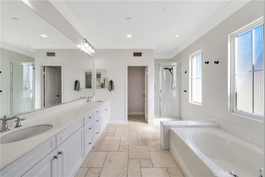 1 Via Santander San Clemente, CA 92673 - Photo 41 of 48 a large bathroom with a tub sink shower and mirror
