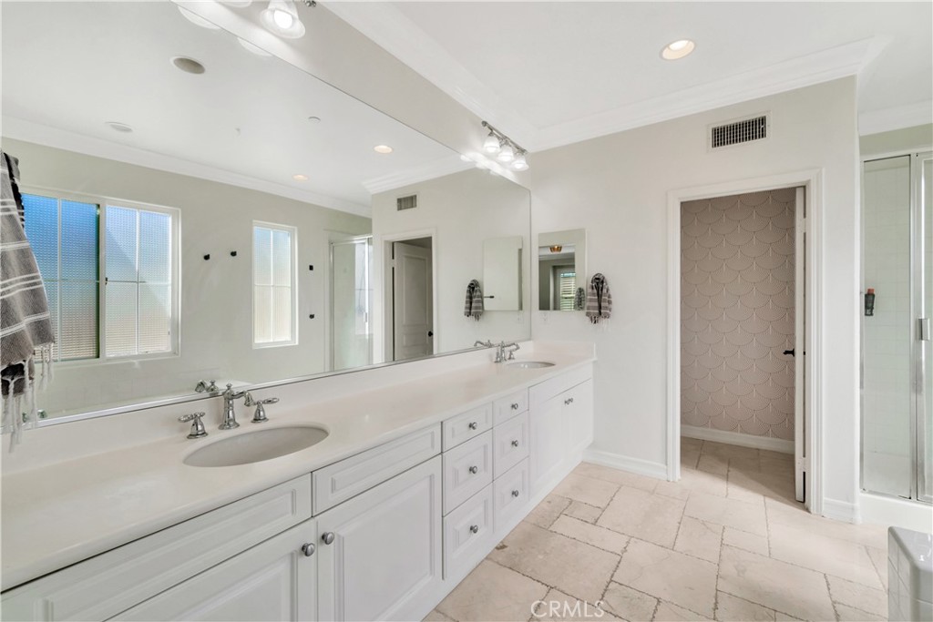1 Via Santander San Clemente, CA 92673 - Photo 42 of 48 a spacious bathroom with double sink and a mirror