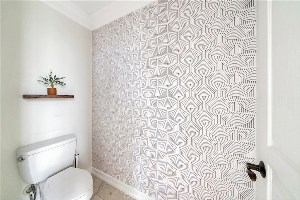 1 Via Santander San Clemente, CA 92673 - Photo 43 of 48 a white toilet sitting next to a white wall