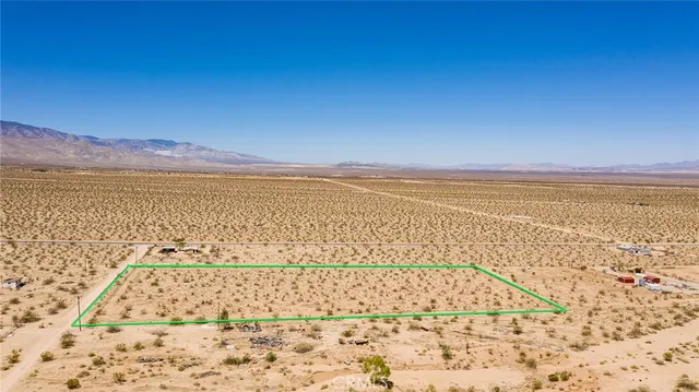 a view of ocean and a mountain