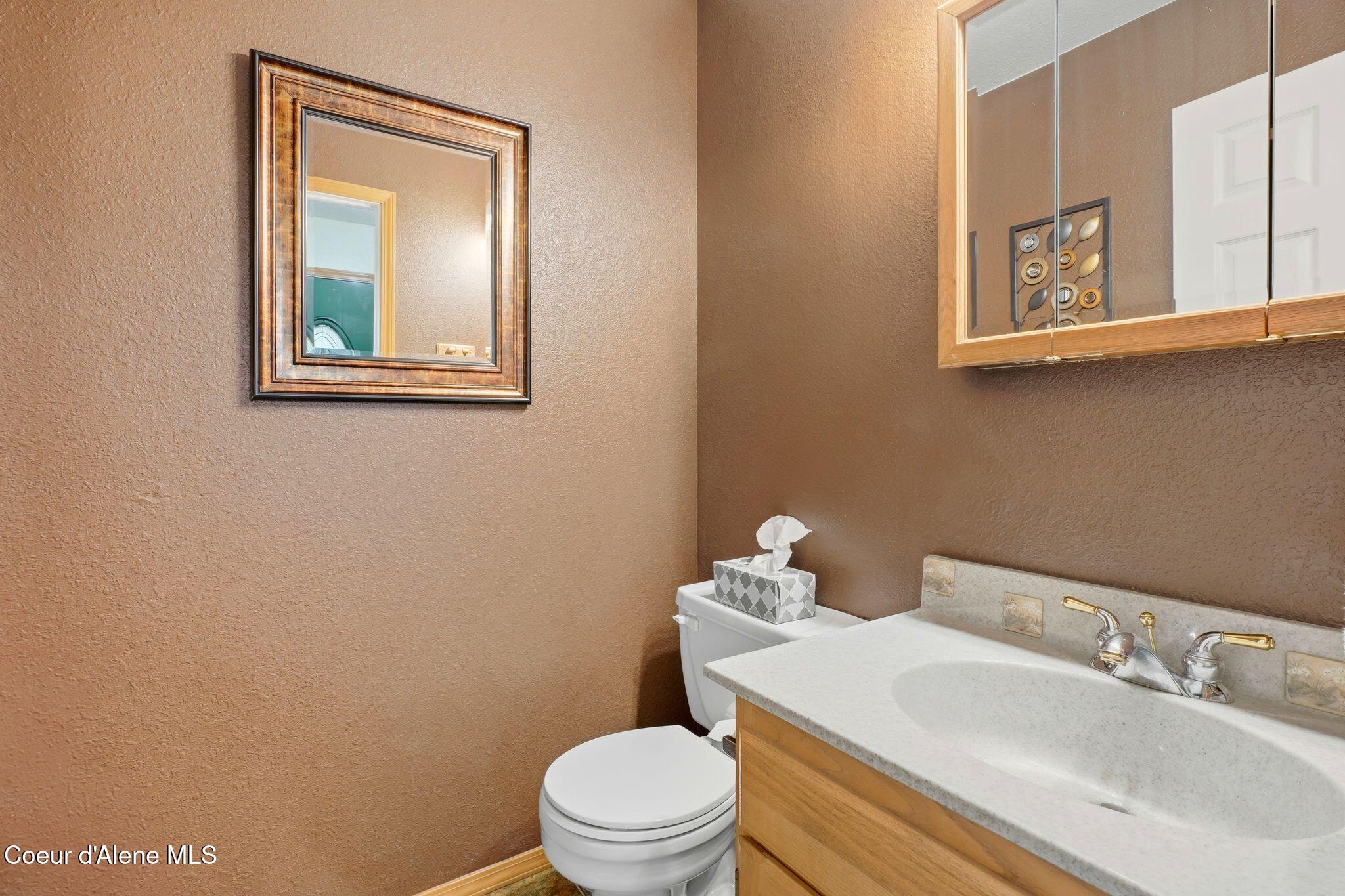 5100 West Golden Avenue Rathdrum, ID 83858 - Photo 13 of 34 Main floor half bath