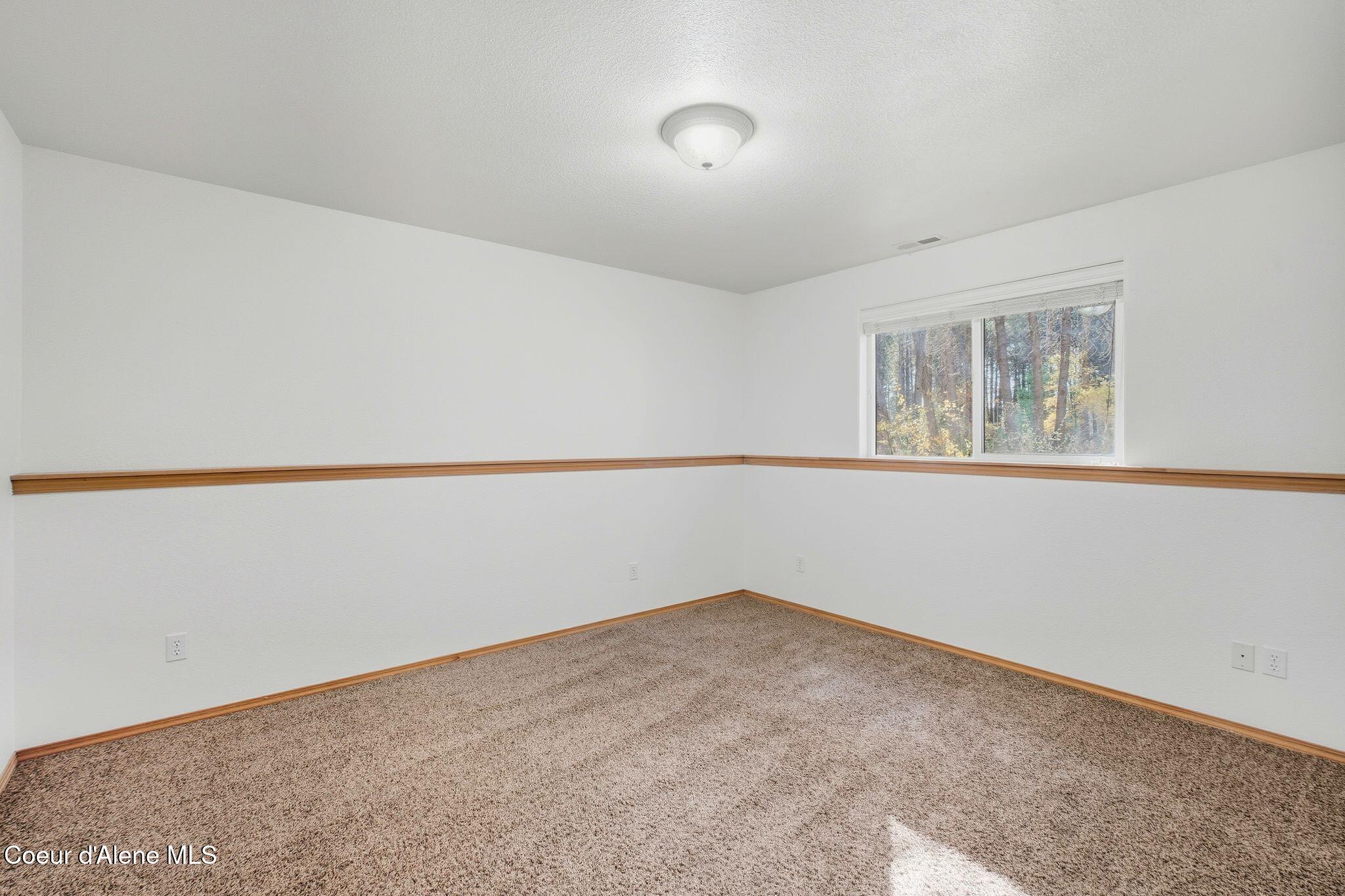 5100 West Golden Avenue Rathdrum, ID 83858 - Photo 20 of 34 Basement bedroom