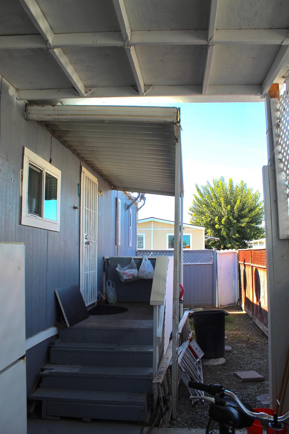 436 North Mercey Springs Road, Unit 154 Los Banos, CA 93635 - Photo 20 of 23 a view of backyard with seating space