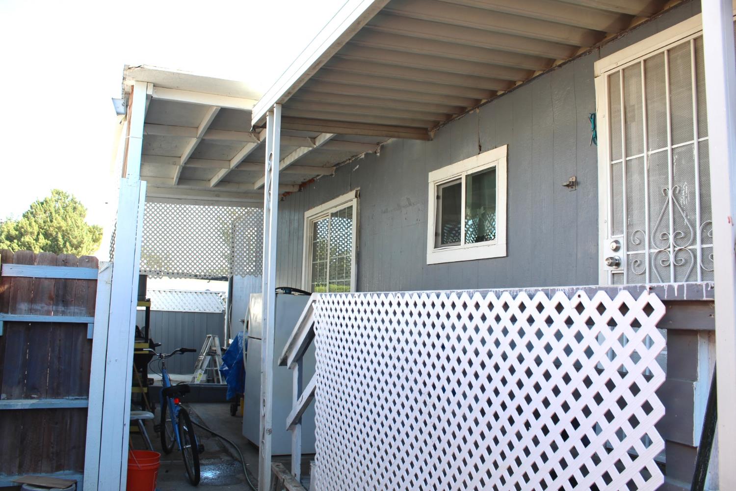 436 North Mercey Springs Road, Unit 154 Los Banos, CA 93635 - Photo 21 of 23 a front view of a house