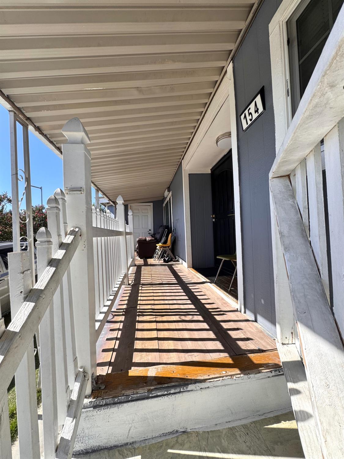 436 North Mercey Springs Road, Unit 154 Los Banos, CA 93635 - Photo 5 of 23 a view of a entryway front of house