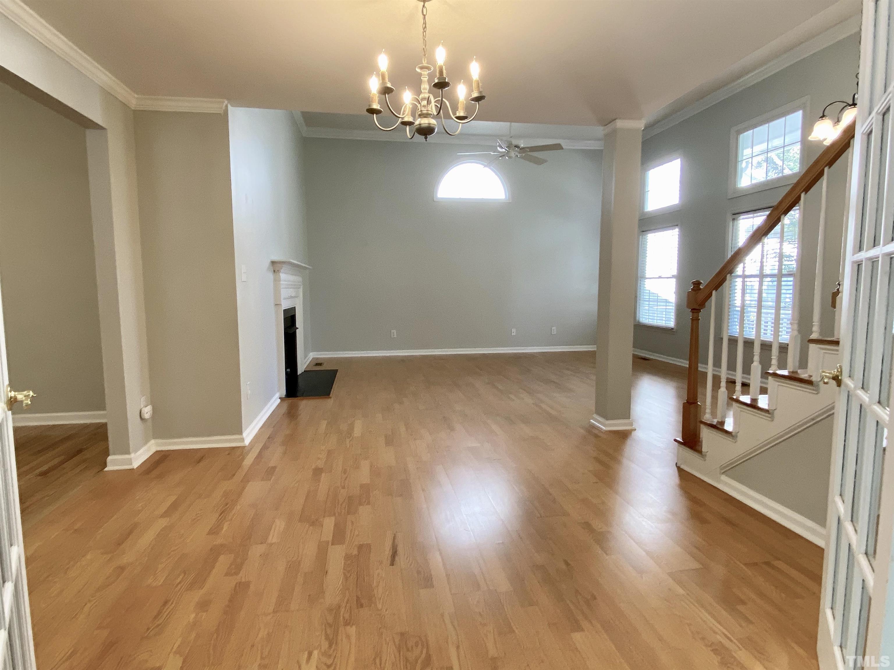 302 Bebington Drive Cary, NC 27513 - Photo 11 of 27 a view of a livingroom with a chandelier